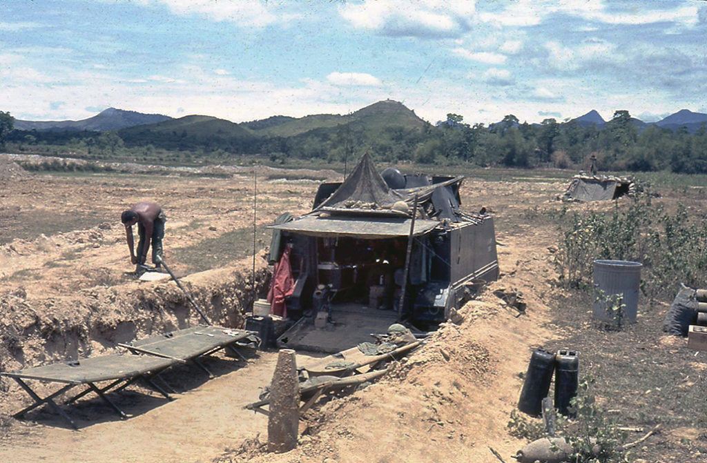 An ACAV crewman from the 11th Armored Cavalry works outside the vehicle.