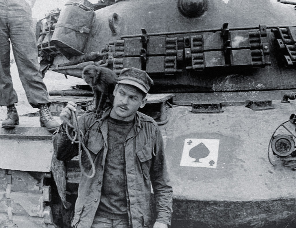 Sgt. John Bartusevics with tank, Charlie Company 1967