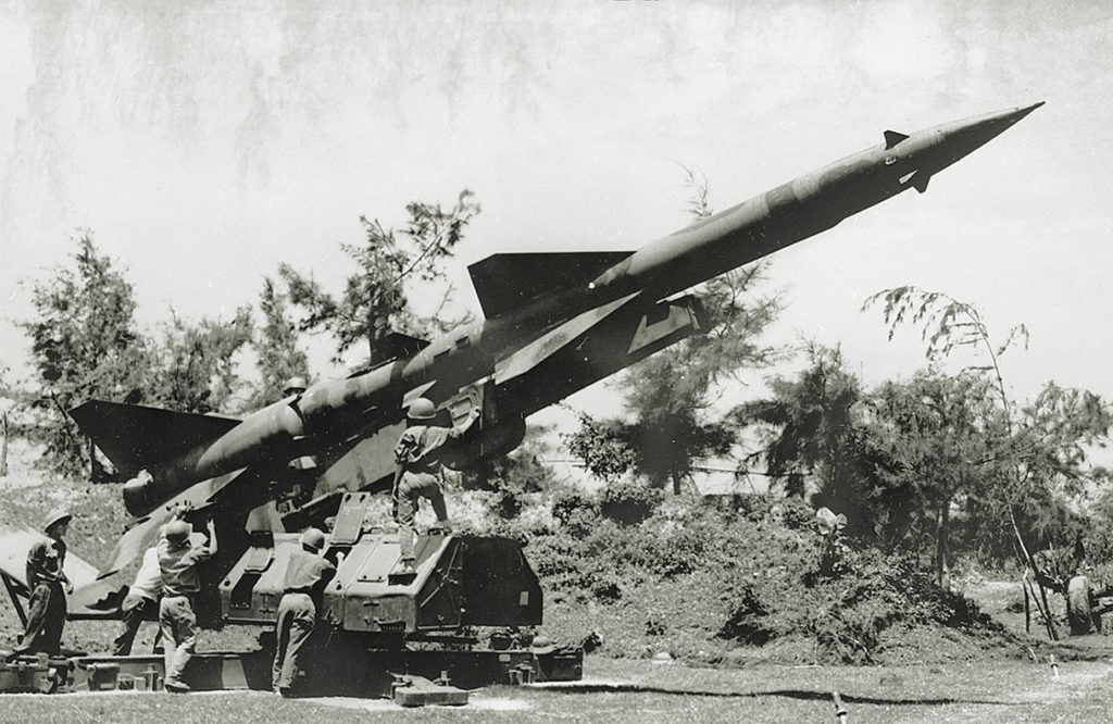 North Vietnamese troops preparing a SA-2 missile installation to action during the Vietnam War.