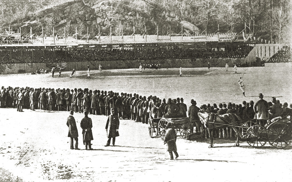 NEW YORK - 1890. The Polo Grounds in New York City is surrounded by fans during a Players League game in 1890.