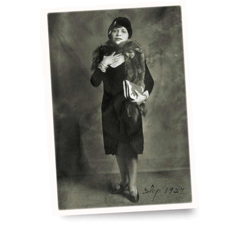 Photo of Polly Adler dressed up.