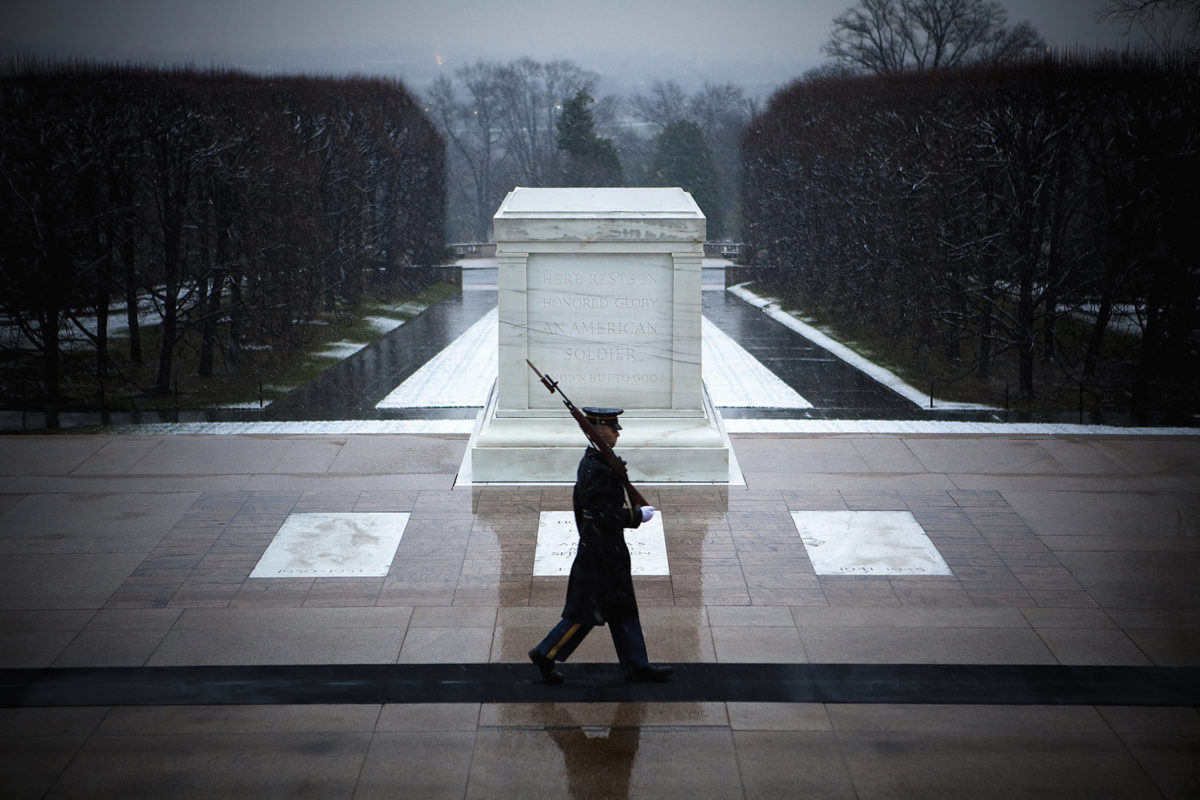 ARLINGTON, VIRGINIA - DECEMBER 5: Army soldiers guard the Tomb of the Unknown Soldier at Arlington National Cemetery on December 5, 2009 in Arlington, Virginia. (Photo by Jeff Hutchens/Getty Images)