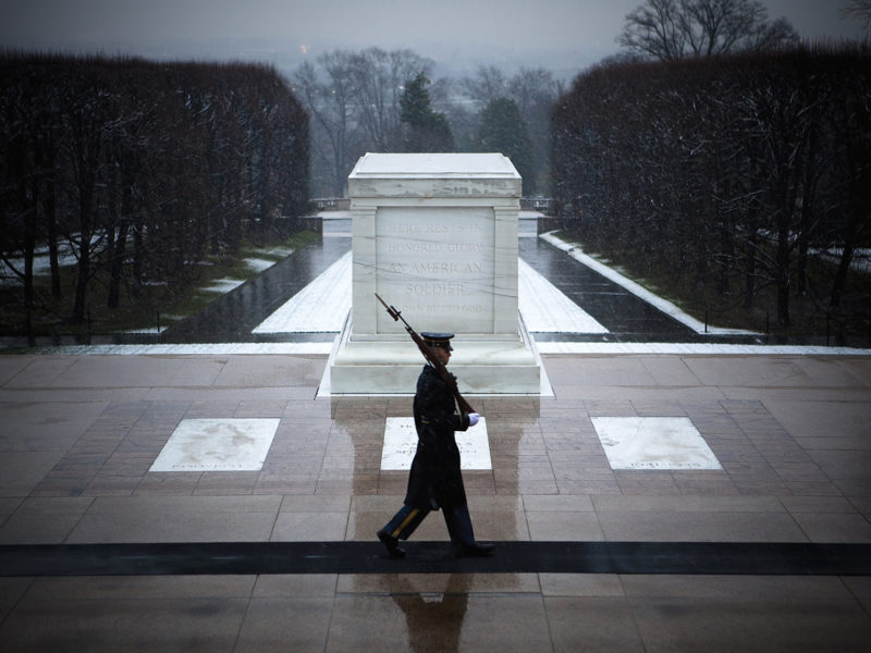 ARLINGTON, VIRGINIA - DECEMBER 5: Army soldiers guard the Tomb of the Unknown Soldier at Arlington National Cemetery on December 5, 2009 in Arlington, Virginia. (Photo by Jeff Hutchens/Getty Images)