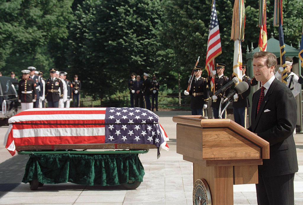 U.S. Defense Secretary William Cohen speaks May 14 during a ceremony at the Tomb of the Unknowns at Arlington National Cemetery, after the remains of a U.S. serviceman from the Vietnam War (L) were exhumed from the Tomb for high-tech identification tests. The disinterment was conducted in response to a plea from the family of Air Force Lt. Michael Blassie, which believes his bones were buried there in 1984. ELD/CM/SB - RP1DRIEHEXAB