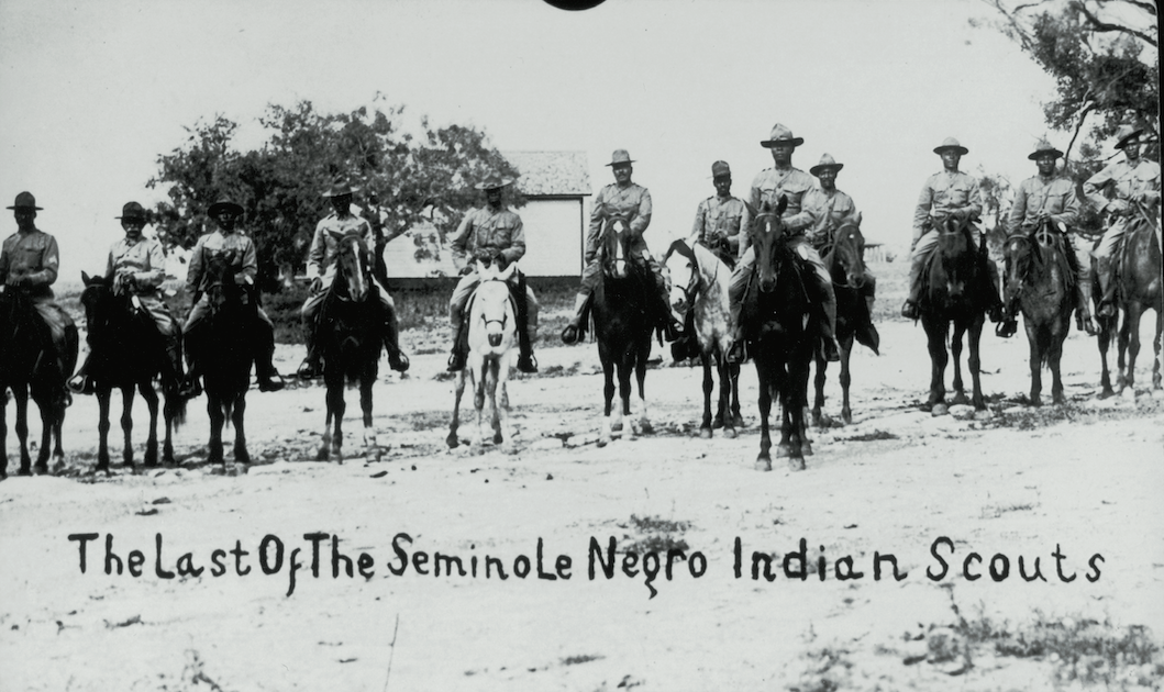 Black Seminole scouts on horseback.