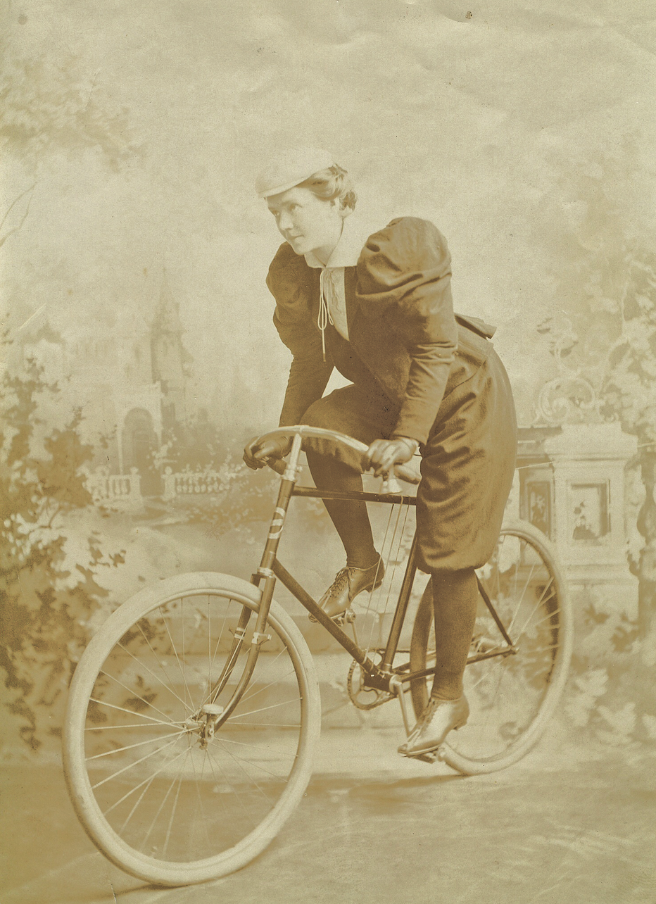 San Franciscan Annie Kirk poses on her bike wearing bloomers (named for Amelia Bloomer).