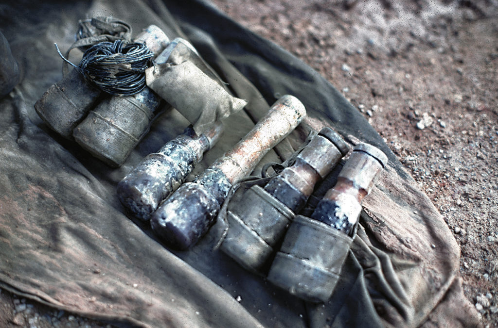 Chinese Communist hand grenades and a booby trapping kit taken from a Viet Cong prisoner by a U.S. Marine after an ambush in Cam Hieu village, Quang Tri Province, Vietnam, on December 4, 1967. (Photo by Ed Palm Photo/Getty Images)