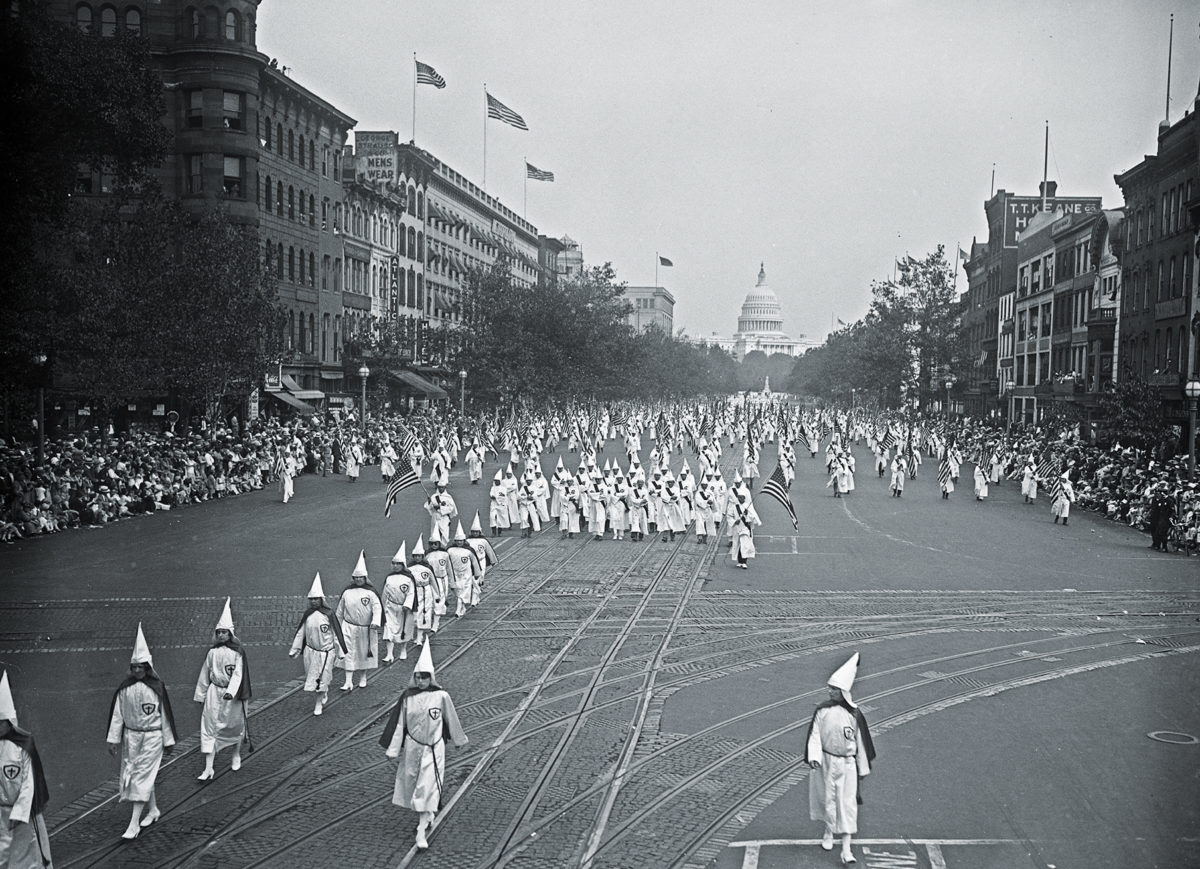 Ku Klux Klan marching down Pennsylvania Ave., Washington, D.C ca. 1926. (Photo by: Hum Images/Universal Images Group via Getty Images)