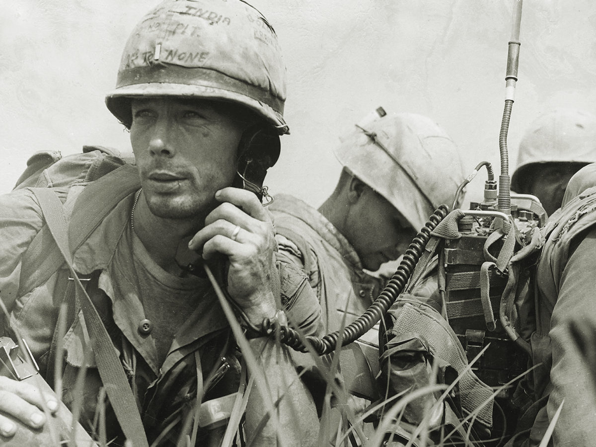 Photo of 1967: A Platoon Commander from the United States 1st Marine Division using a radio during operations in Vietnam. (Photo by Three Lions/Getty Images)
