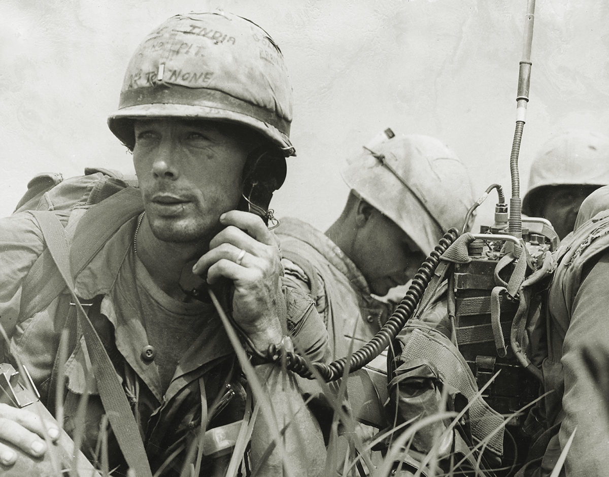Photo of 1967: A Platoon Commander from the United States 1st Marine Division using a radio during operations in Vietnam. (Photo by Three Lions/Getty Images)