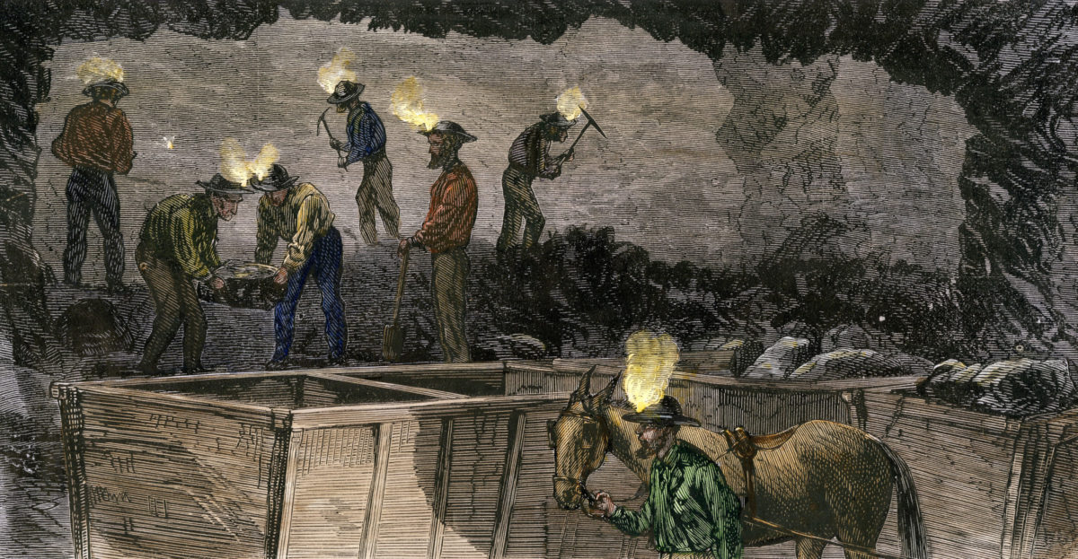 Coal miners working underground