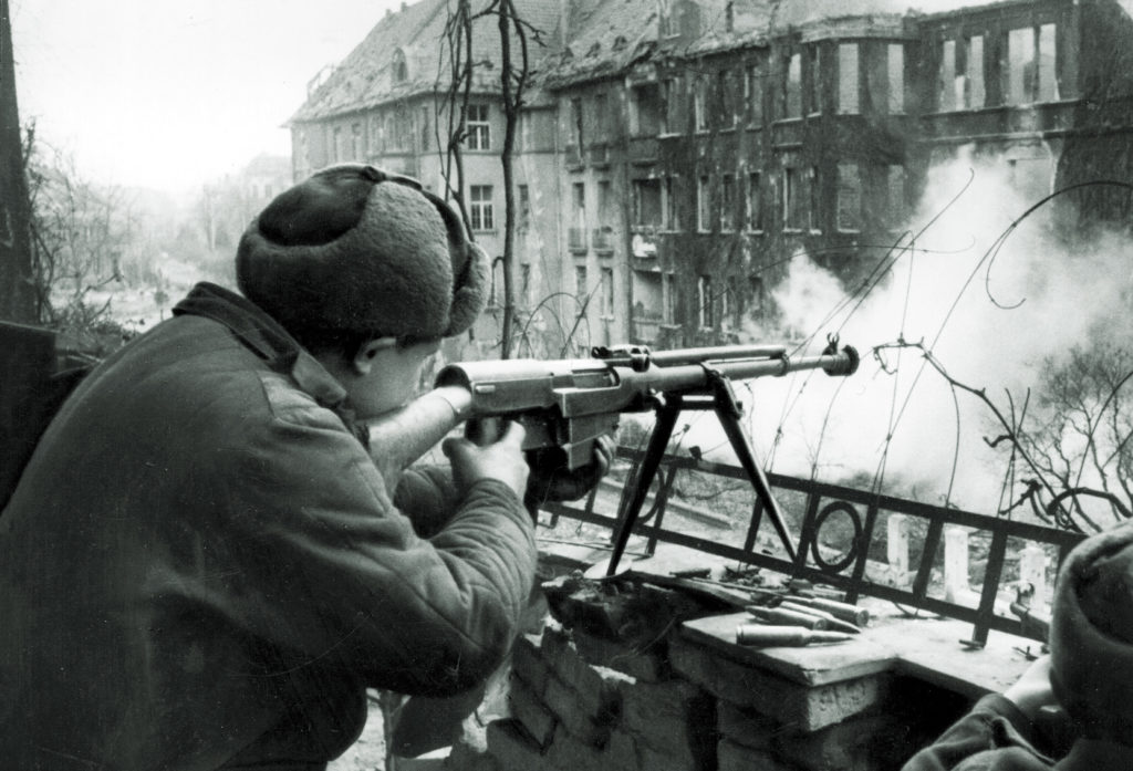 Soviet soldier fires antitank rifle