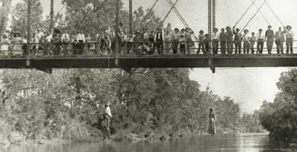 Photo of The lynching of Laura and Lawrence Nelson on 25 May 1911 in Okemah, Oklahoma.