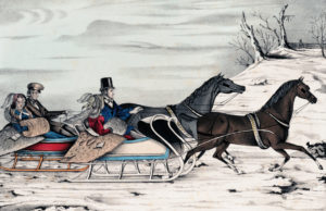 Horse-drawn sleighs race in snow