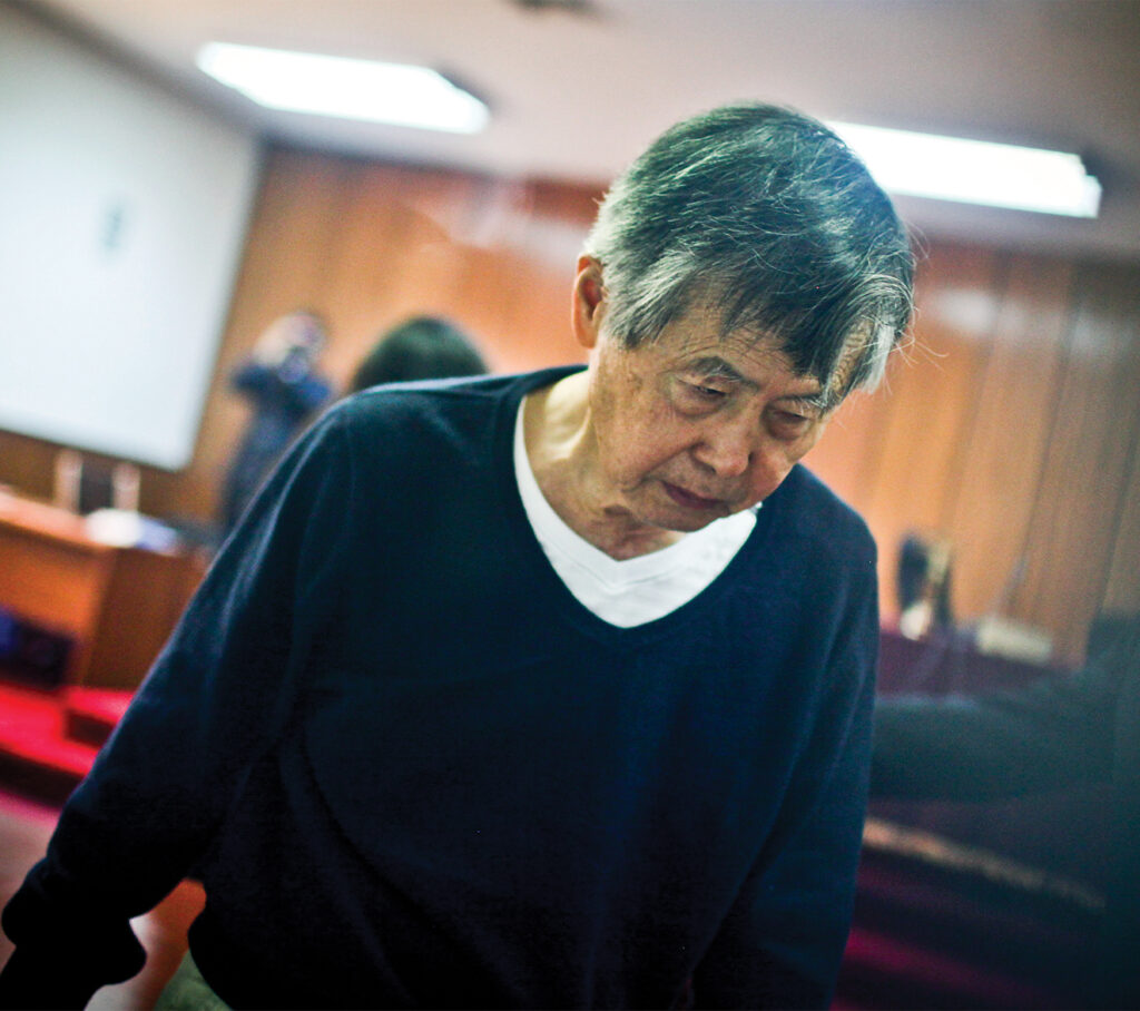Photo of Peru's former President (1990-2000) Alberto Fujimori arriving for a hearing at a courtroom in Lima on October 17, 2013. The 75-year-old Fujimori is serving a 25-year prison sentence after being convicted in 2009 of human rights violations during his 10-year presidency from 1990 to 2000.