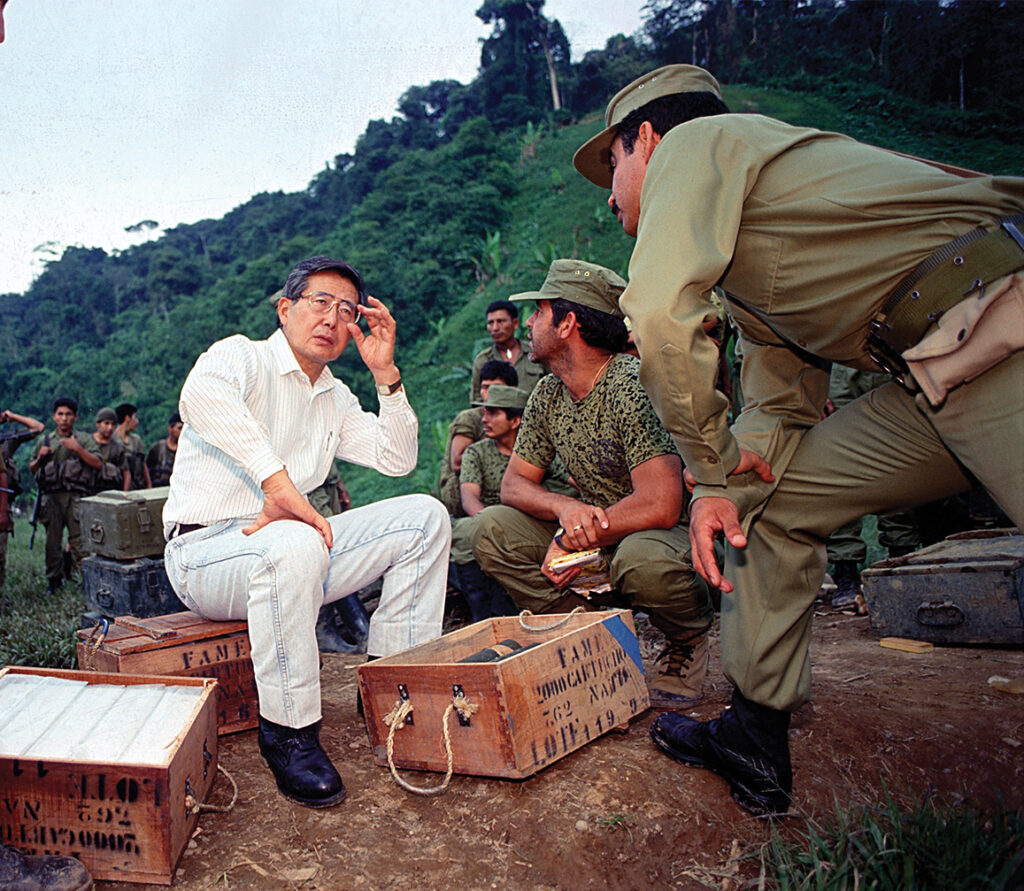 Photo of Peruvian President Alberto Fujimori was caught between fighting Shining Path rebels and Ecuadorian troops.