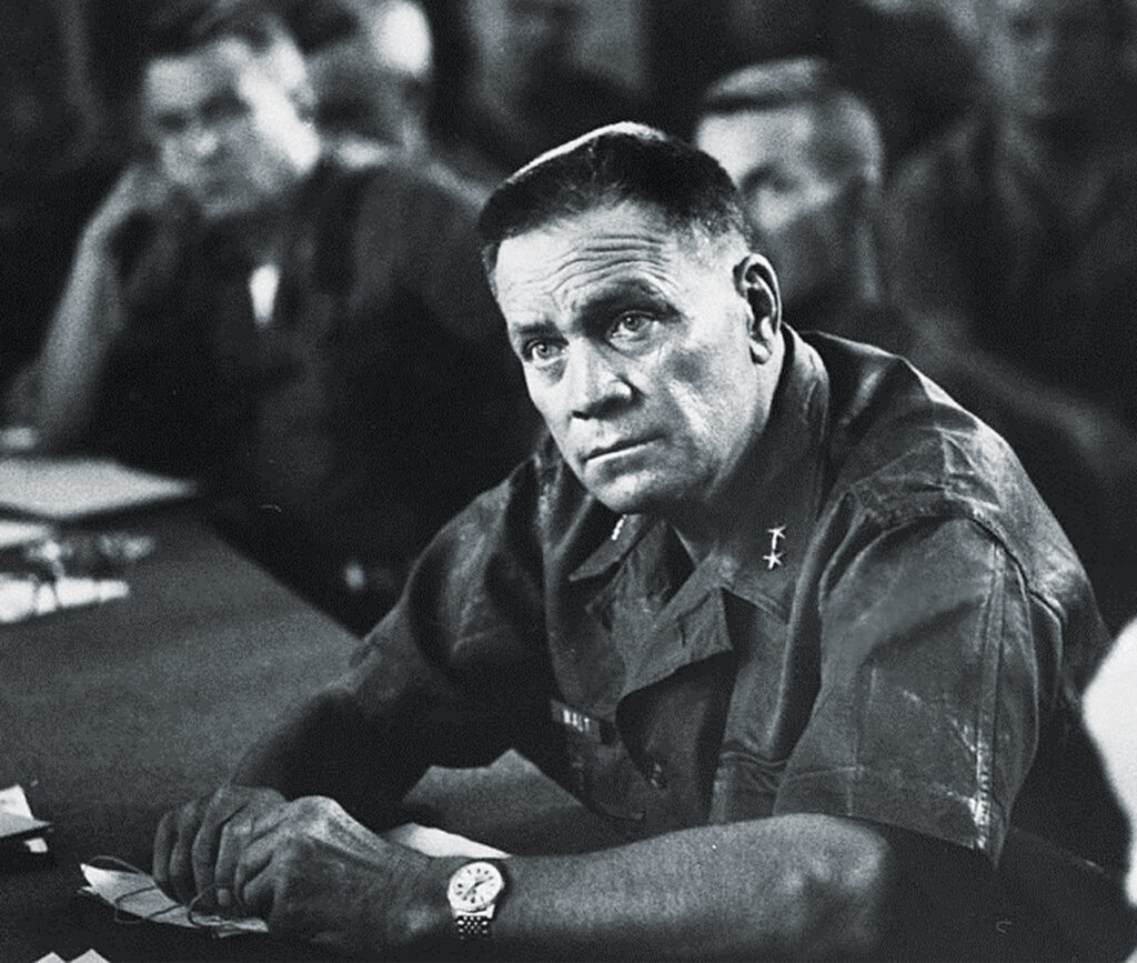 Photo of Maj. Gen. Lewis W. Walt attending briefing in Da Nang. January 01, 1965