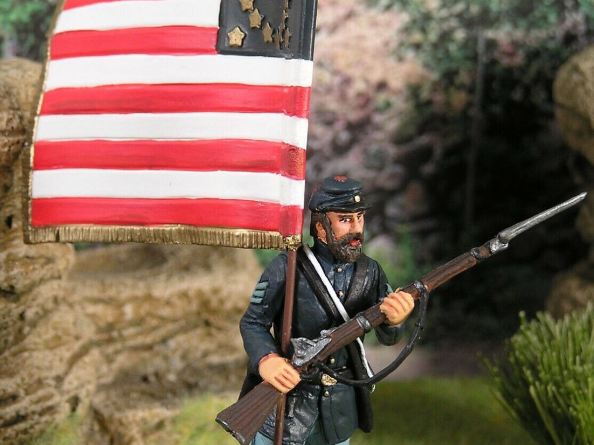 Andrew Tozier figurine holding flag and musket