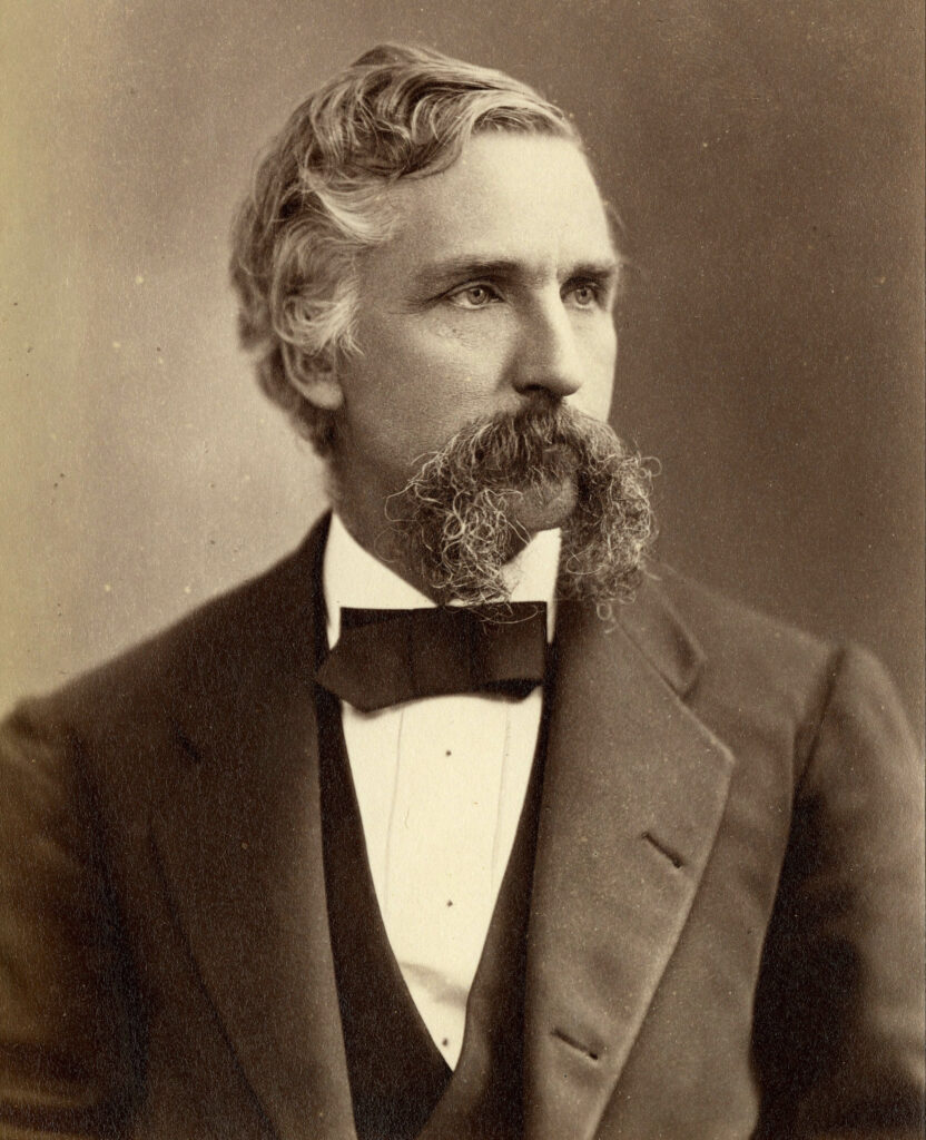 Joshua Chamberlain in suit and bowtie