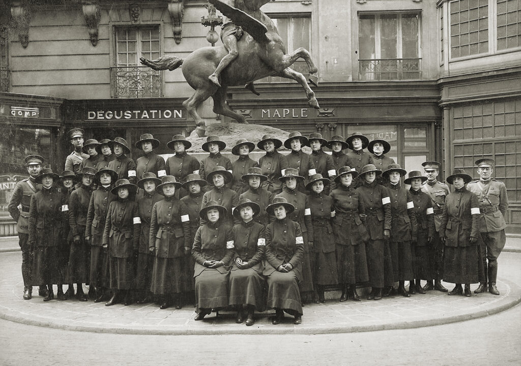 Photo of Thirty-three operators and their four officers pose on arrival in France. Though they served in wartime in uniform, the Hello Girls were denied veteran status.