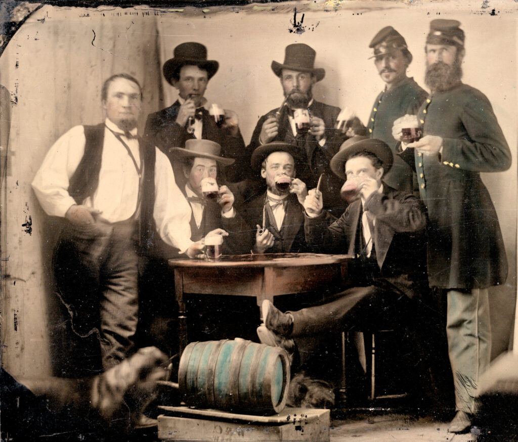 Oregon Cavalry officers pose in a saloon