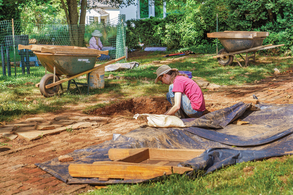 Photo of an Archeologists excavating the original house at James Monroe's Highland home and plantation in Charlottesville, Virginia.