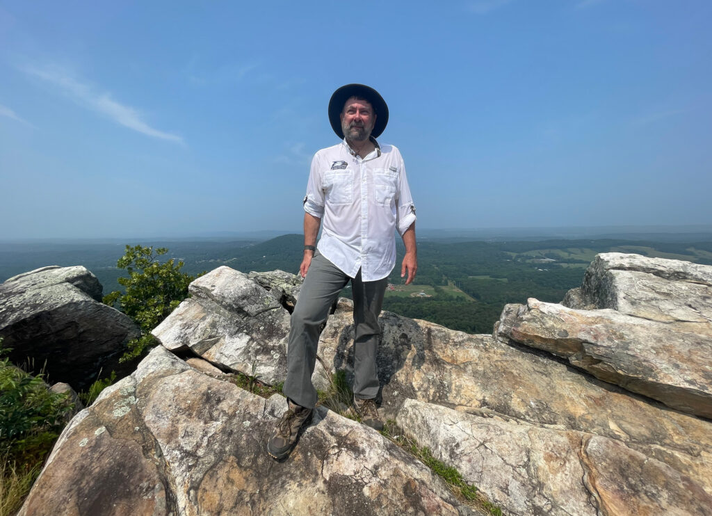 Bob Jenkins stands at top of Rocky Face Ridge