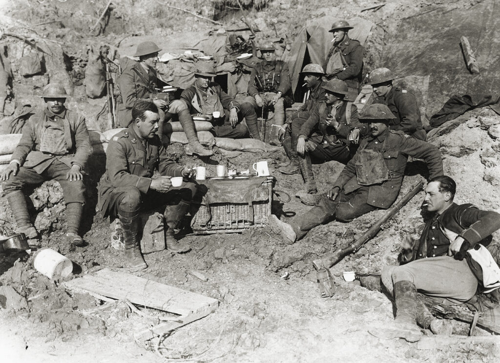 Photo of Englishman soldiers in World War I, breaking for tea on the front line.