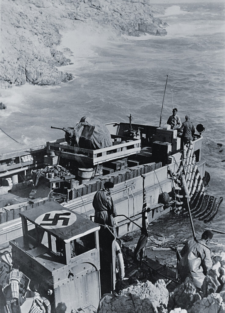Photo of German troops landing on Leros with shallow-draft vessels.
