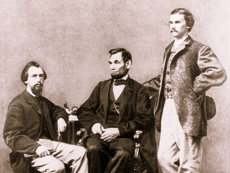 John Nicolay and John Hay with President Lincoln