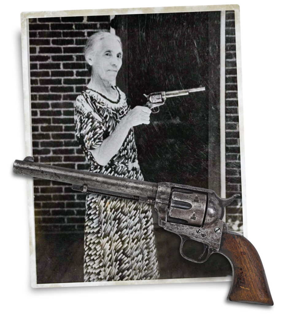 “Pauline” Garrett with Pat Garrett's Colt revolver