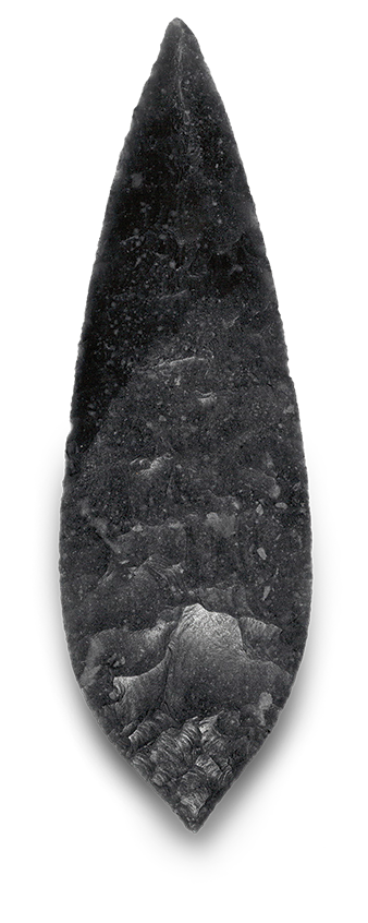 Photo of a razor-sharp obsidian point.