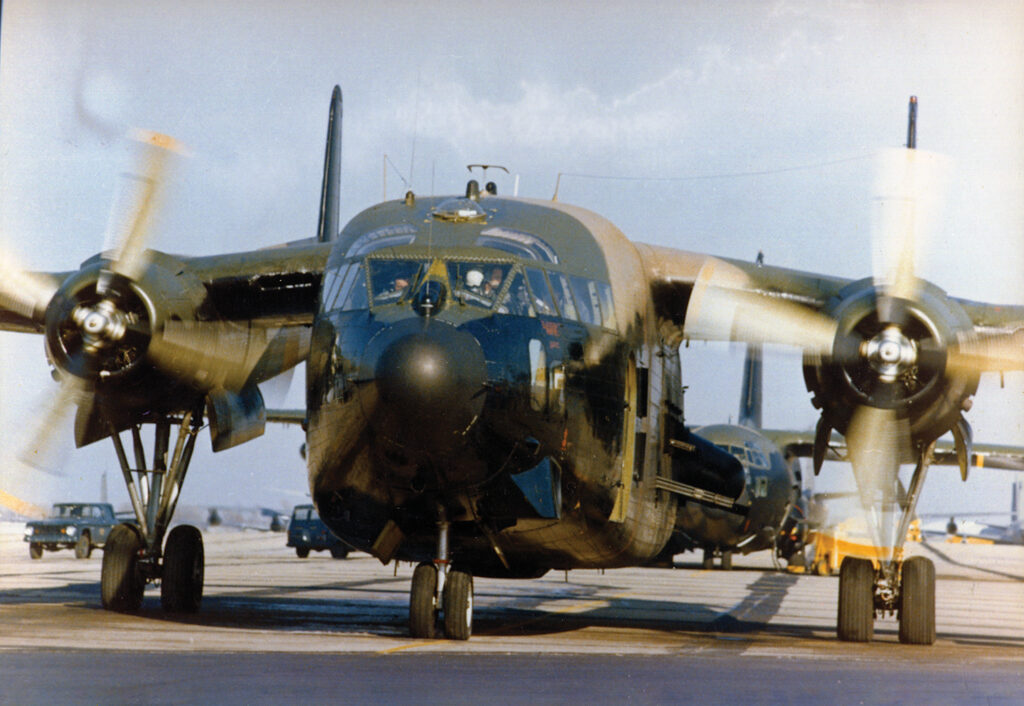 Photo of a Fairchild AC-119K Stinger stands ready for action in Vietnam. The high-powered guns of the AC-119K and AC-119G Shadow, both modified Fairchild C-119 “Flying Boxcar” cargo airplanes, provided potent ground support for U.S. troops in war zones.