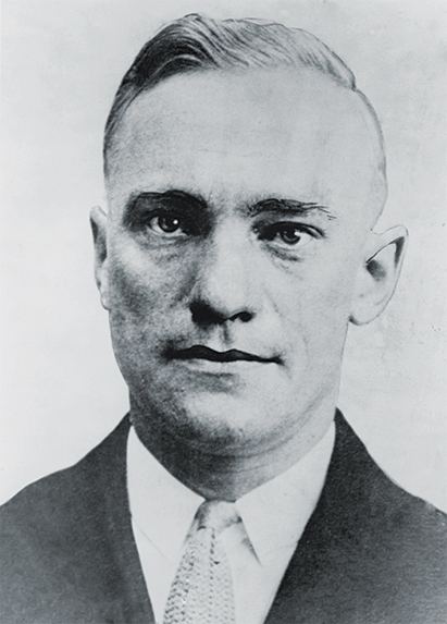 Photo of Fred 'The Brain' Goetz, in a 1934 police mugshot. Goetz was a college graduate in engineering and a Lieutenant in U. S. Army.