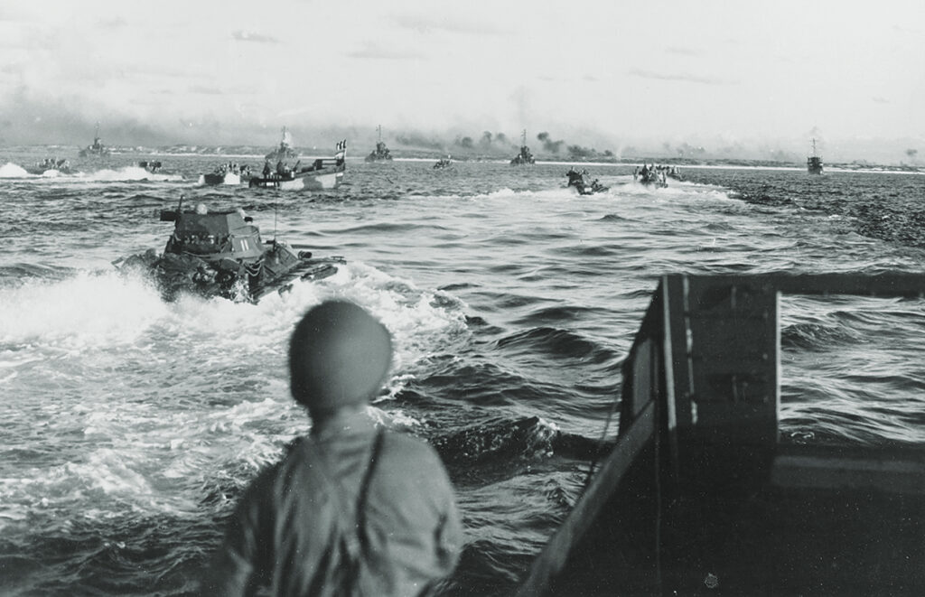 Photo of on the third run, this one at Okinawa, the LCSs ran ahead of the landing craft, then turned broadside to open up with all guns.