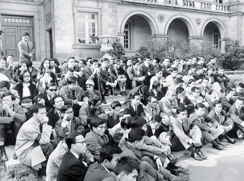 Photo of Vietnamese students sit in a courtyard at City University in Paris, Aug. 27, 1963, at the start of a proposed 24-hour hunger strike against actions of the government in South Viet Nam. The government has put the country under martial law to quell protests of Buddhist monks and students.