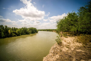 A tree-lined stretch of the Rio Grande