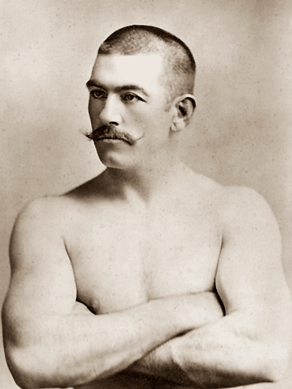 Photo of John Lawrence Sullivan, also known as the Boston Strong Boy, in his prime. He was recognized as the first heavyweight champion of gloved boxing from February 7, 1882 to 1892, and is generally recognized as the last heavyweight champion of bare-knuckle boxing under the London Prize Ring rules