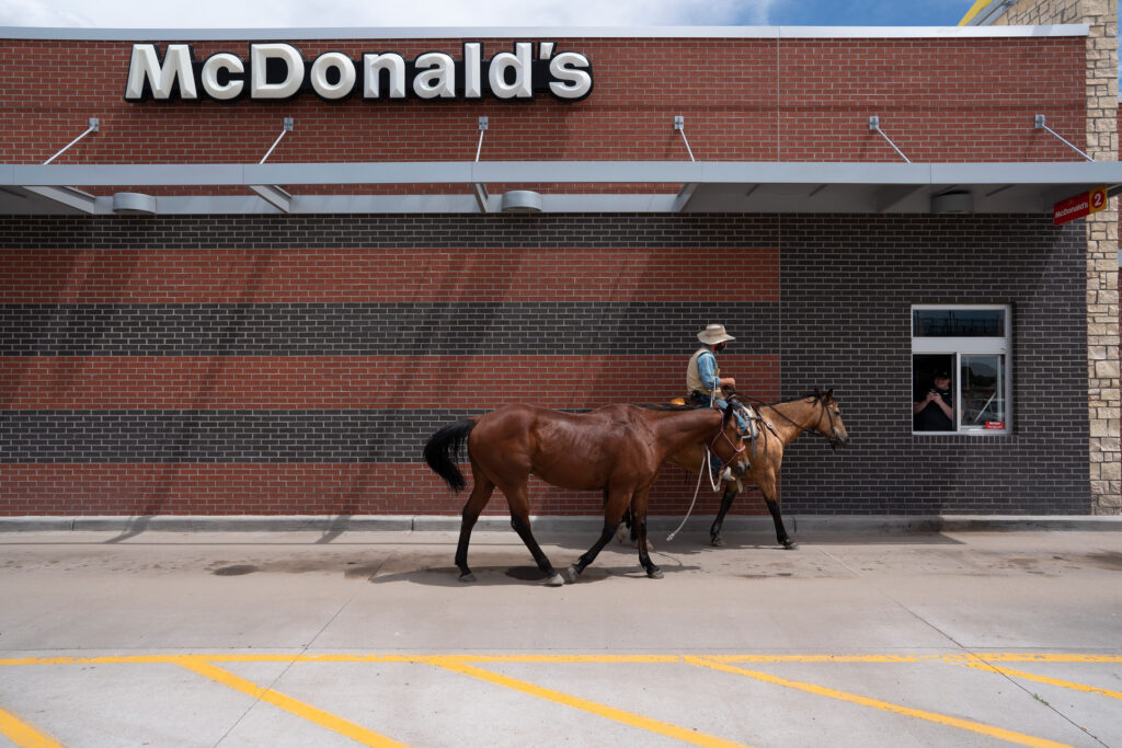 On horseback in McDonald's drive-thru