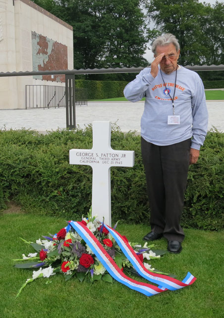 Willie Novelli, a veteran of Patton's 3rd Army, salutes his former commander