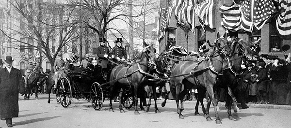 Theodore Roosevelt rides in an open carriage toward the U.S. Capitol for his March 4, 1905, inaugural. A troupe of cowboys from Teddy's beloved West were the hit of the parade. (Library of Congress)