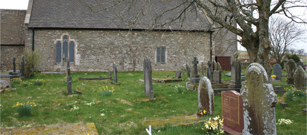 The coffins of men who died in the pit were carried by the hands of their comrades more than four miles, to be buried in this churchyard at Eglwysilan.