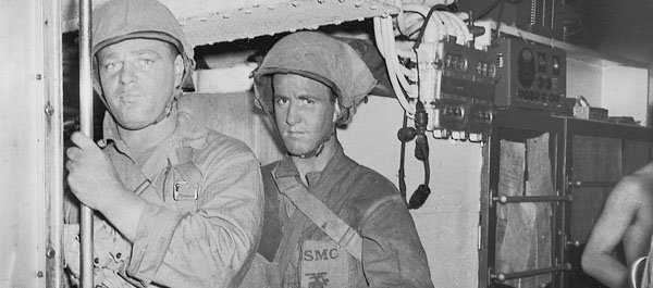 Sergeant Walter Carroll and Pfc Dean Winters of the U.S. Marines Second Raider Battalion prepare to debark from the submarine USS Nautilus before the Makin Atoll raid. The strike was designed to divert Japanese attention from the U.S. landings on Guadalcanal and boost American morale (Photo: National Archives).