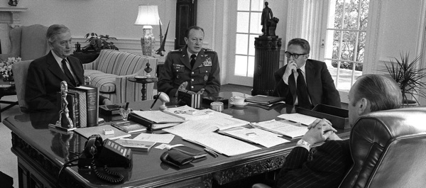 Two days after a March 25, 1975, Oval Office meeting with President Gerald Ford, Ambassador Graham Martin and Sec. of State Henry Kissinger, Army Chief of Staff Gen. Frederick Weyand (in uniform) was sent to Saigon to tell President Nguyen Van Thieu that the American troops would not fight in Vietnam again. (Gerald R. Ford Library/David Hume Kennerly)