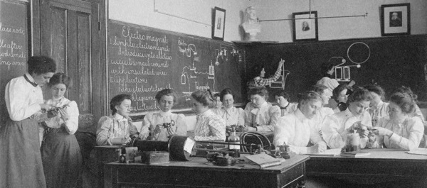 Young women studying electromagnets in a Washington, DC, normal school around 1899. Library of Congress.