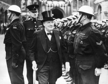 A youthful-looking Prime Minister Churchill inspecting Civil Defense personnel in London at the outbreak of the Second World War (National Archives).