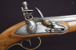  A flintlock pistol’s hammer is partially retracted, or “halfcocked” (John cairns/istockphoto). 