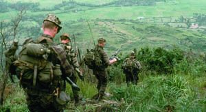 Like the 2nd Brigade patrol on a bomb damage assessment mission led by Sgt. Steve Bonert on June 1, 1967, a small LRRP team patrols into an enemy controlled area near the An Loa Valley. (Courtesy of Douglas Parkinson)