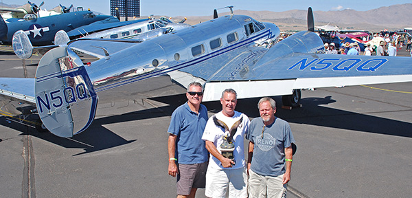 From left: George Scott, Matt Walker and Mike Kvasnik with their award-winning 1946 Beechcraft D-18S. [Photo: Jim Dunn]