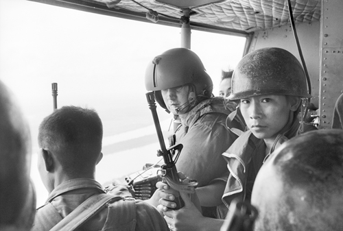 Australian door gunner Joe Ralph (center) laid down covering fire during the many insertions of South Vietnamese troops like these. (Australian War Memorial, NAVYM0476/19) 
